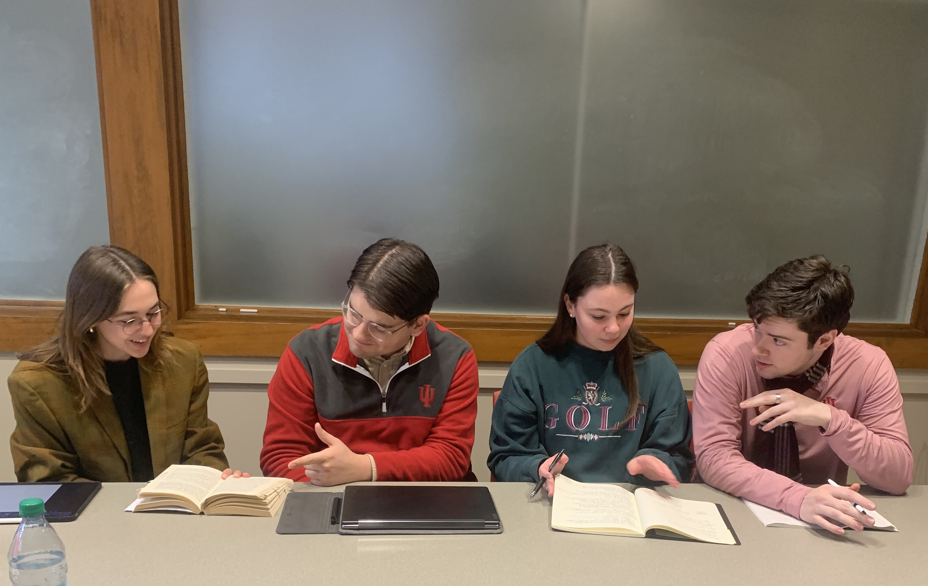 Four REEI students studying together